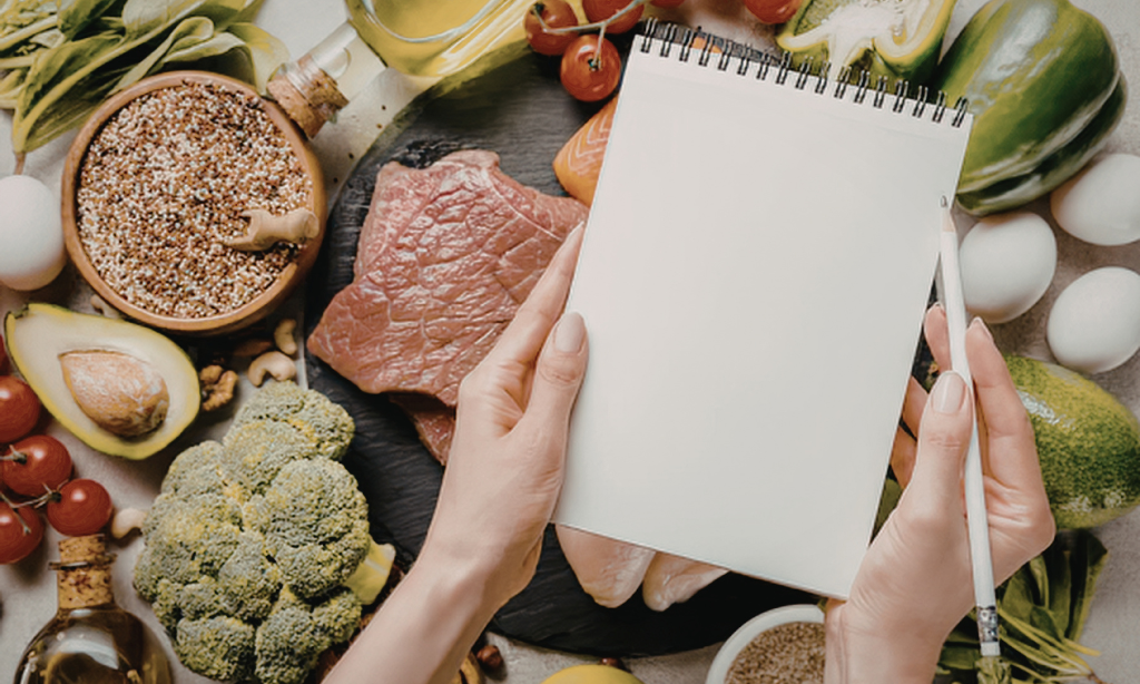 Balanced diet with vegetables, protein, and grains supporting gut microbiome and overall health