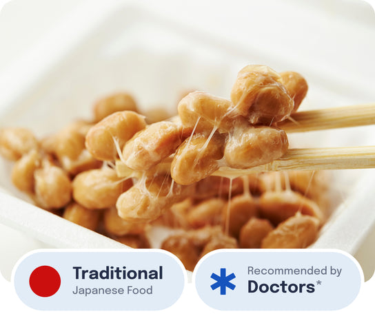 Chopsticks holding sticky natto