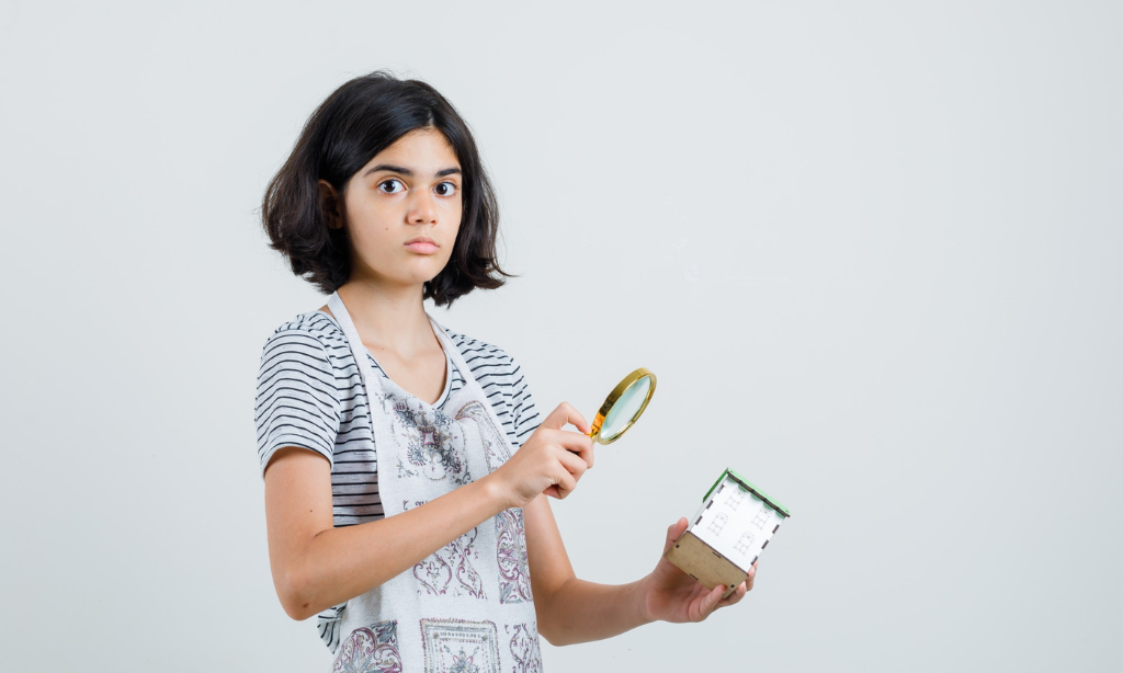 Young woman examining a product box with a magnifying glass, representing price comparison, supplement research, and smart buying decisions.