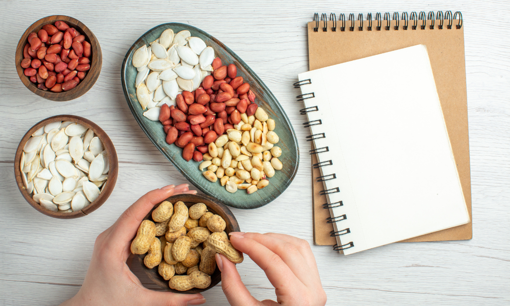 Various nuts and seeds rich in healthy fats and nutrients, representing foods often discussed in relation to omega-3 and heart health.