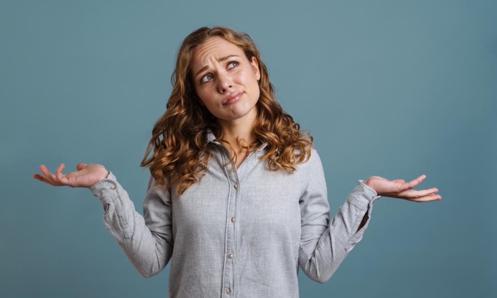 Woman looking confused while comparing wellness supplements and wondering what makes Sonomono different from regular wellness products.