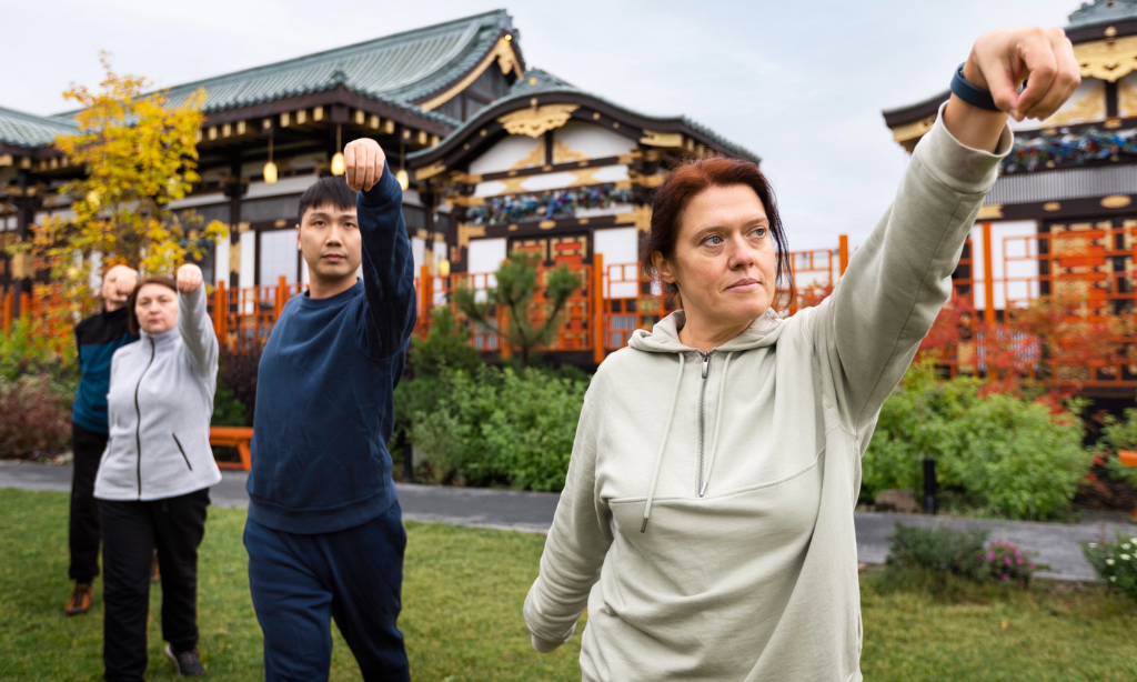 People participating in traditional Japanese-inspired exercise and movement practices, highlighting Japanese longevity, wellness habits, and healthy ageing.